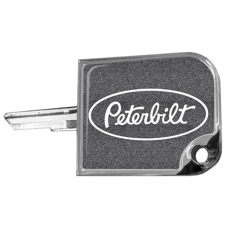 CK-SKC2-P1-5778 rectangular small key cover, Peterbilt oval logo, metallic black